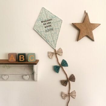 Welcome To The World, Hanging Fabric Kite, Turquoise Cotton With Baby Animal Print And Four Fabric Bows, 7 of 11