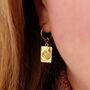 Evil Eye Charm Huggie Hoop Earrings, thumbnail 3 of 5