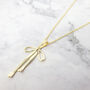 Minimalist Ribbon Bow Charm Gold Plated Necklace, thumbnail 1 of 4