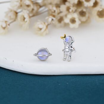 Sterling Silver Mismatched Astronaut And Planet Stud Earrings, 2 of 9