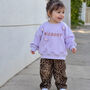 Personalised Girls Cotton Sweatshirt With Hand Crochet Flowers, thumbnail 1 of 10