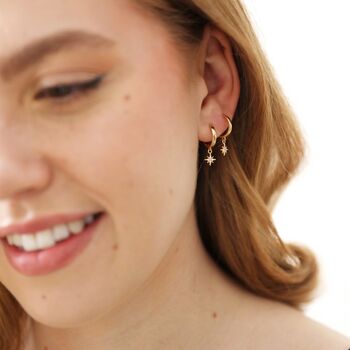 Tiny Star Charm Huggie Hoop Earrings In Gold Plating, 2 of 6