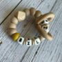 Beech Wood And Silicone Baby Teething Rattle, thumbnail 2 of 3