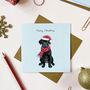 Festive Black Labrador Christmas Card, thumbnail 1 of 2