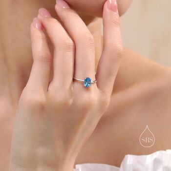 Sterling Silver Natural One Carat Swiss Blue Topaz Oval Ring, 5 of 11