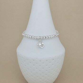 Bead Bracelet With Two Sterling Silver Heart Charms, 2 of 3