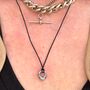 Mini Donut Charm Pendant In Silver On Black Cord Necklace, thumbnail 2 of 3
