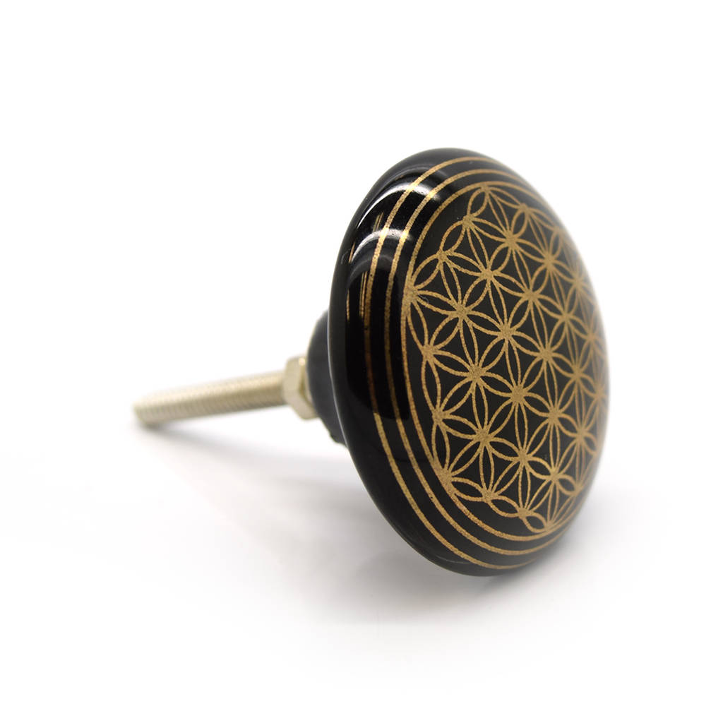 black and gold round patterned ceramic cupboard knobs by pushka home