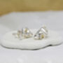 Contemporary Silver Flower Stud Earrings, thumbnail 1 of 9