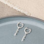 Linear Huggie Crystal April Birthstone Earrings, thumbnail 2 of 7
