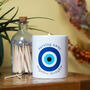 Evil Eye 'Burning Away Negative Thoughts' Candle, thumbnail 1 of 3