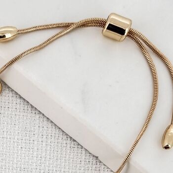 White And Gold Curb Chain Bracelet With Three Hearts, 2 of 3