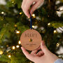 Personalised Baby's First Christmas Wooden Bauble, thumbnail 1 of 6