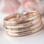 Blessed Slim Brass Bangle In Gold Or Silver Finish, thumbnail 8 of 12