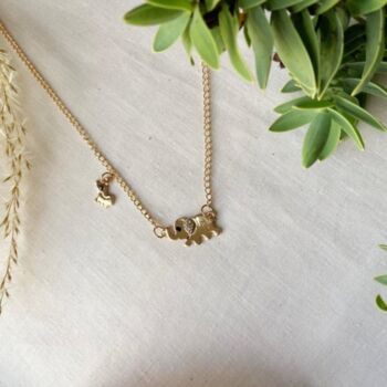 Golden Elephant Baby Charm Necklace, 2 of 3
