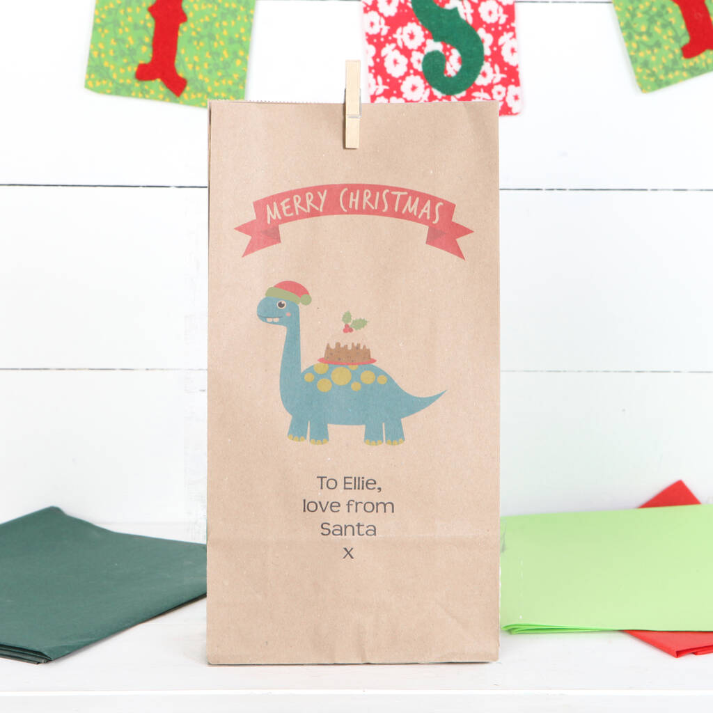 Personalised Dinosaur Christmas Gift Bags By Red Berry Apple