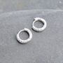 Unisex Sterling Silver Textured Huggie Earrings, thumbnail 1 of 6