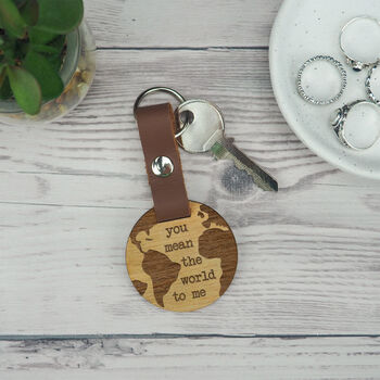 Engraved 'You Mean The World To Me' Wood Globe Keyring, 2 of 4