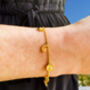Gold Plated Engraved Moon, Star And Sun Charm Bracelet, thumbnail 2 of 8