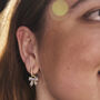 Gold Forget Me Not Bow Huggie Earrings, thumbnail 2 of 11