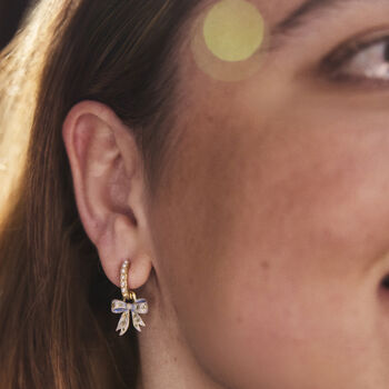 Gold Forget Me Not Bow Huggie Earrings, 2 of 11