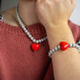 Pastel Grey Bead And Red Heart Bracelet, thumbnail 3 of 4