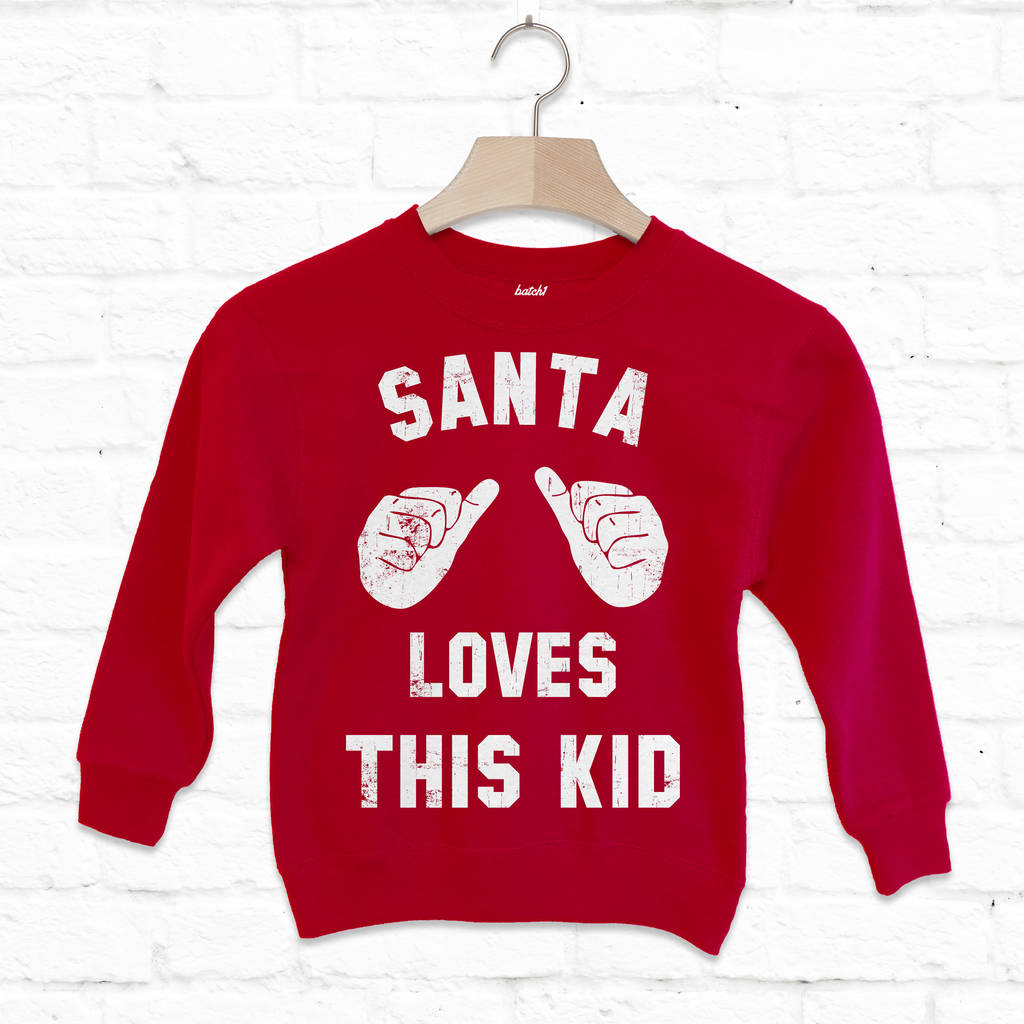 Santa Loves This Kid Children's Christmas Sweatshirt, 1 of 5