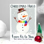 Personalised Snowman Hugs Christmas Card, thumbnail 1 of 6