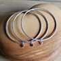 Triple Bangle Set With Heart Charms, thumbnail 1 of 2