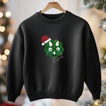 Personalised Black Christmas Jumper With Sparkling Dinosaur Face, 7 of 7