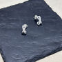 Sterling Silver Kiss Cross Huggie Earrings, thumbnail 3 of 6