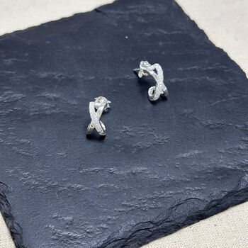 Sterling Silver Kiss Cross Huggie Earrings, 3 of 6