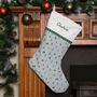 Personalised Christmas Stocking 'Skiing Santa', thumbnail 1 of 3