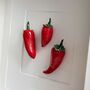 Ceramic Kitchen Wall Art: Three Red Chillies, thumbnail 2 of 4