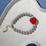 Pastel Grey Bead And Red Heart Bracelet, thumbnail 1 of 4