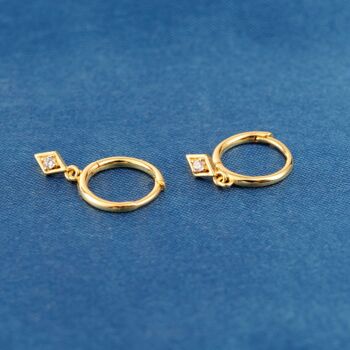 Gold Hoop Earrings With Diamond Shaped Charm, 7 of 7