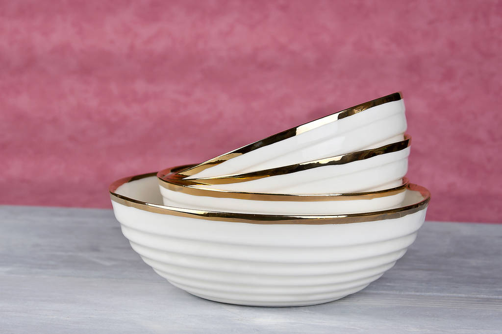 porcelain serving bowl with thick gold rim by kina ceramics