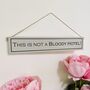 This Is Not A Bloody Hotel Hand Painted Wooden Sign, thumbnail 2 of 3