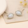 Sterling Silver White Opal Oval Stud Earrings, thumbnail 1 of 11