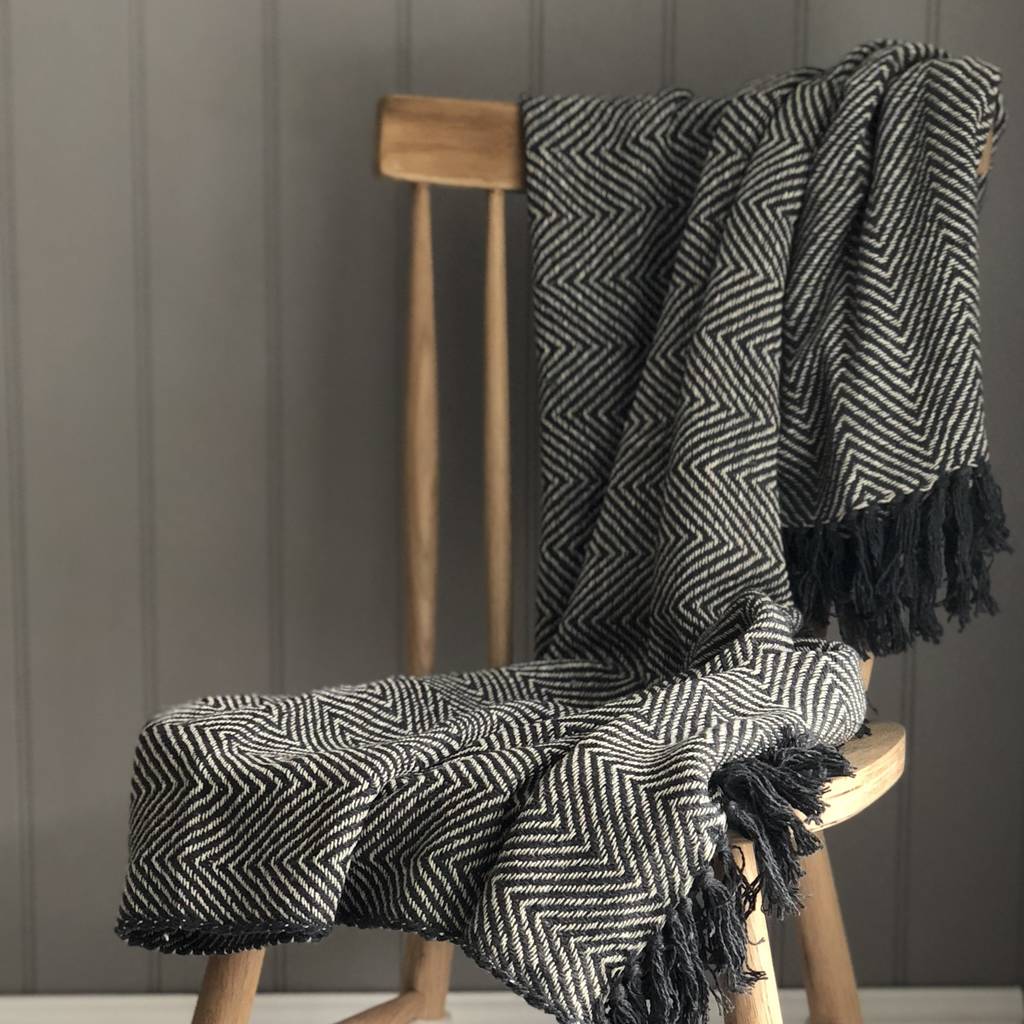 grey chevron throw by the contemporary home