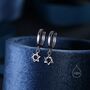 Pair Of Star Of David Huggie Hoop Earrings, thumbnail 3 of 10