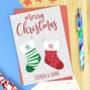 Mr And Mr Stocking Christmas Card, thumbnail 1 of 2