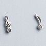 Sterling Silver Tiny Sparkly Music Note Stud Earrings, thumbnail 1 of 6