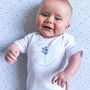Personalised Birth Flower Baby Grow, thumbnail 1 of 6