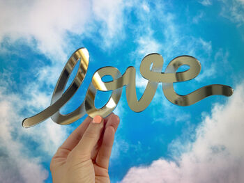 Love Sign Made From Silver Mirrored Acrylic, 2 of 3