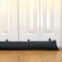 Grey Waterproof Draught Stopper With Hanging Loops, thumbnail 3 of 6