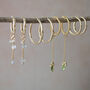 She Blooms Hoops Gold Vermeil And Peridots, thumbnail 7 of 8