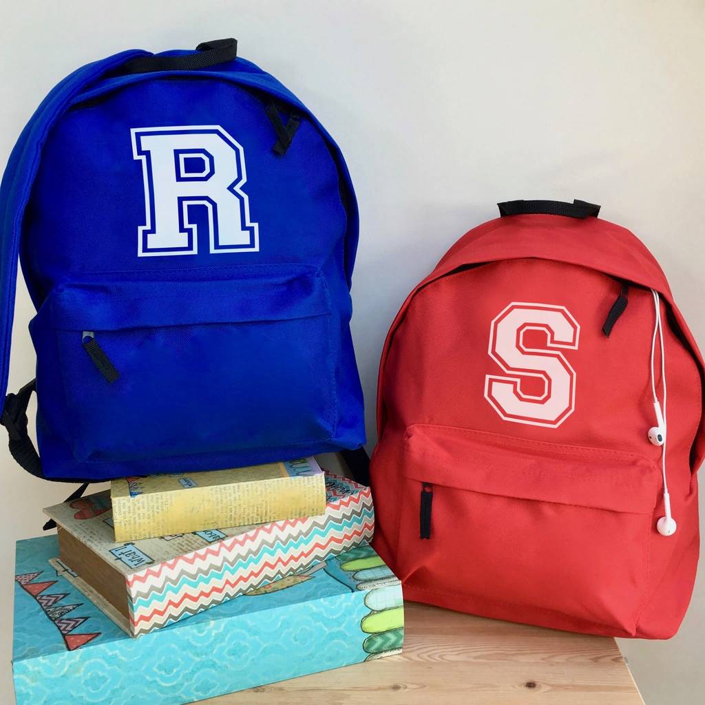 personalised letter school backpack by pink pineapple home & gifts