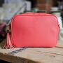 Single Zip Cross Body Bag With Tassel In Coral, thumbnail 1 of 3