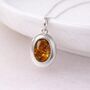 Personalised Sterling Silver Baltic Amber Gemstone Locket Necklace With Photos, thumbnail 1 of 7